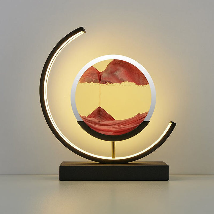 "3D Sand Shell Table Lamp emitting soothing green LED light; modern art-inspired design with dynamic sand patterns."