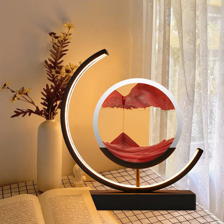 "3D Sand Shell Table Lamp emitting soothing green LED light; modern art-inspired design with dynamic sand patterns."