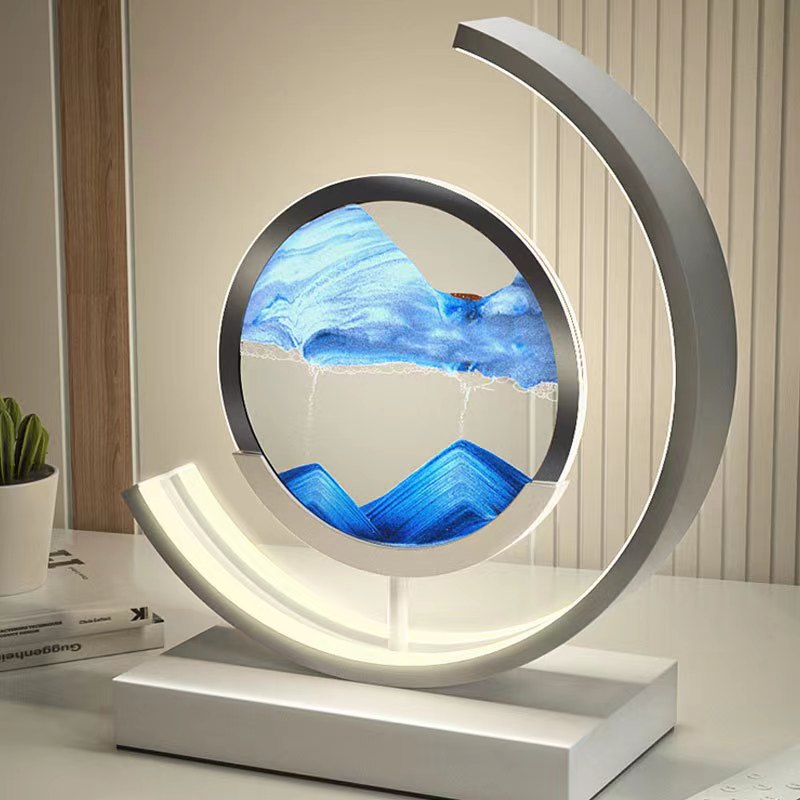 "3D Sand Shell Table Lamp emitting soothing green LED light; modern art-inspired design with dynamic sand patterns."