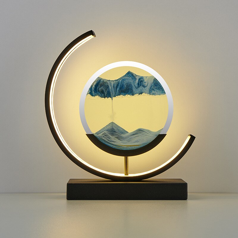 "3D Sand Shell Table Lamp emitting soothing green LED light; modern art-inspired design with dynamic sand patterns."