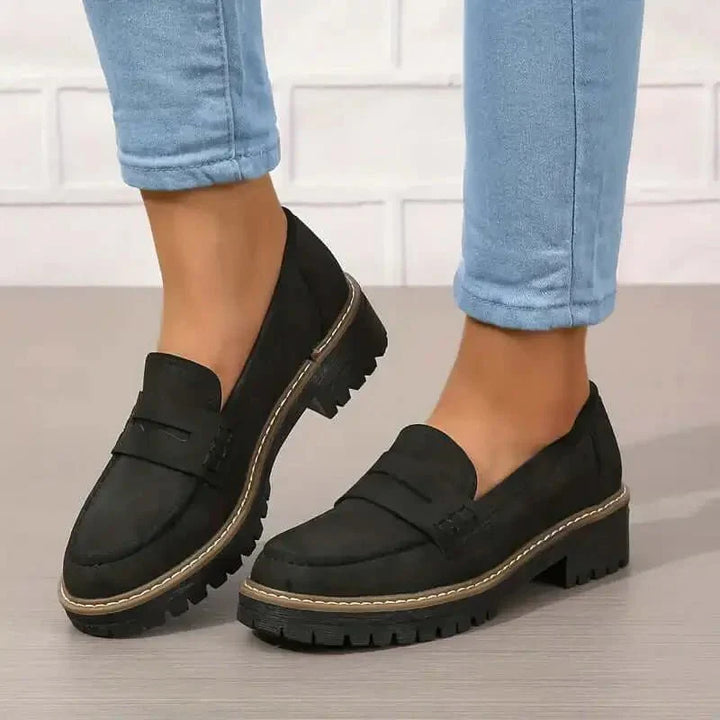 "Comfortable women's slip-on suede sandals showcasing soft suede texture and supportive sole for stylish all-day wear."