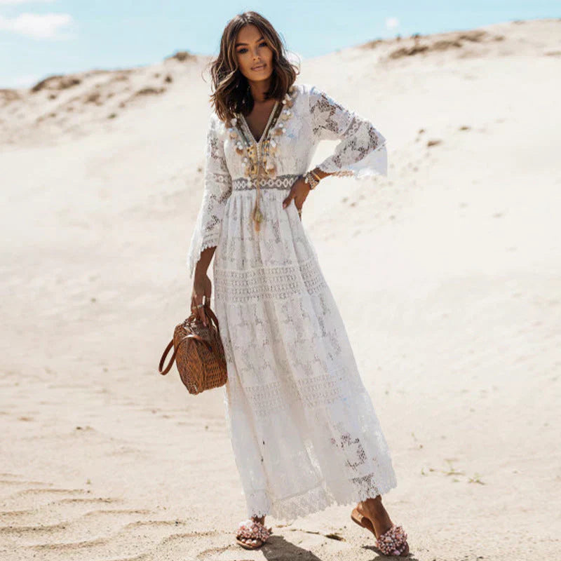 "Elegant women's long-sleeved boho dress with artistic flair, featuring bohemian pattern and flowing silhouette."
