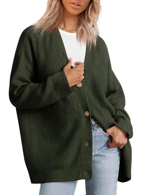 Front view of a soft, stylish women's cashmere cardigan in beige, showcasing its elegant, timeless silhouette for layering.