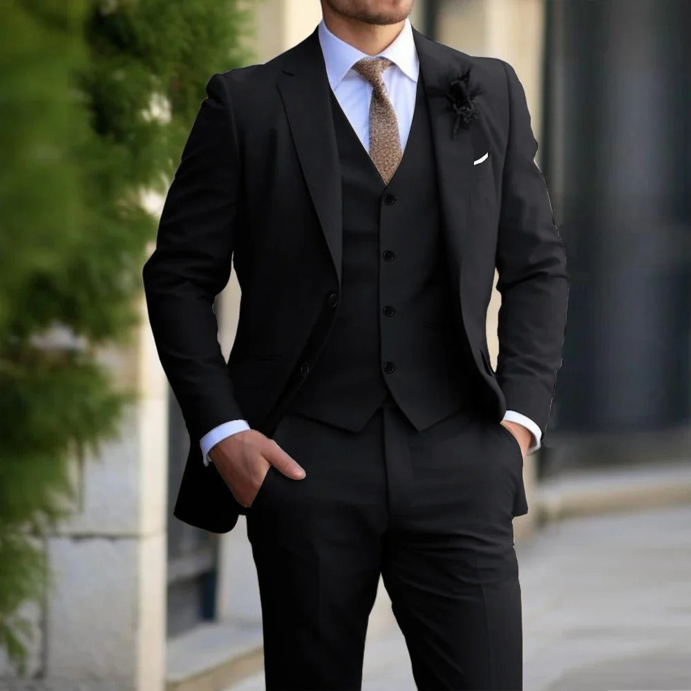 "Men's slim fit 3-piece suit in beige on mannequin; sleek blazer, vest, trousers; perfect for formal events; versatile attire