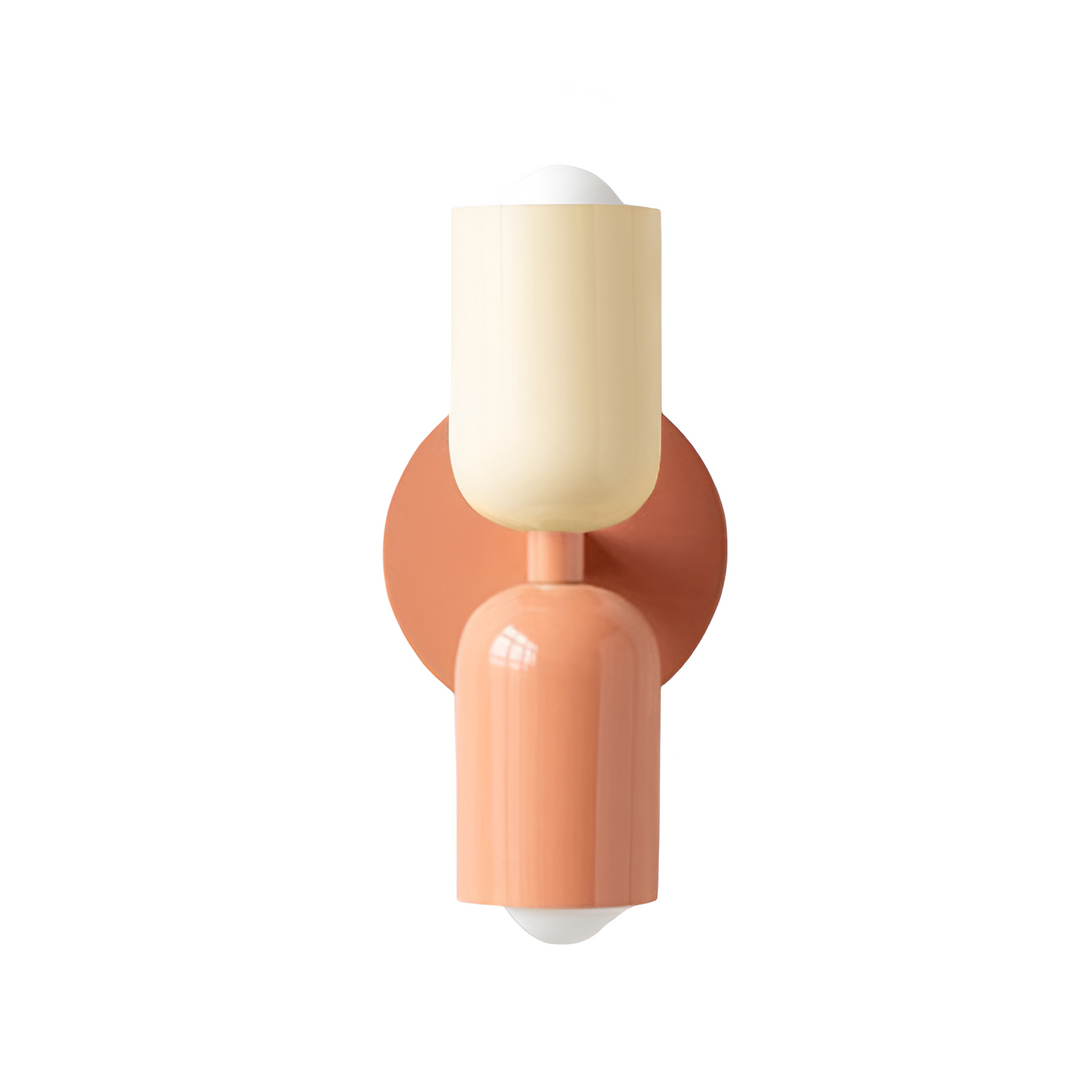 Nordic colourful double head wall light in vibrant colors, painted iron, sleek cylindrical design, casts light up and down.