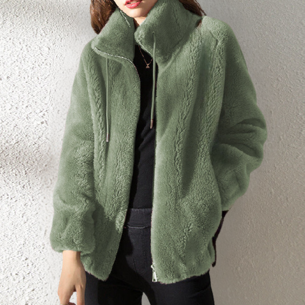 "Stylish women's warm jacket, grey, zip closure, premium polyester, elegant design, versatile fit for the chilly season."