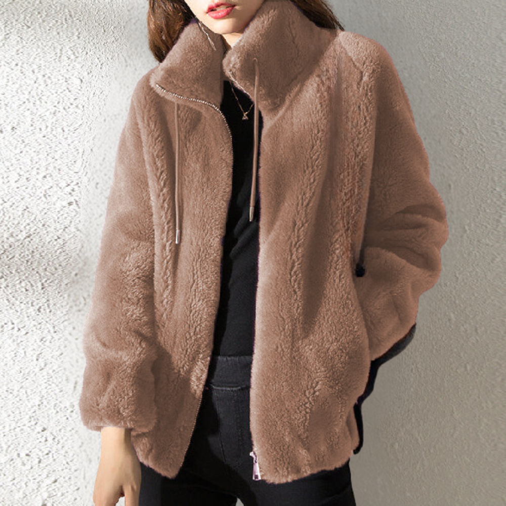"Stylish women's warm jacket, grey, zip closure, premium polyester, elegant design, versatile fit for the chilly season."
