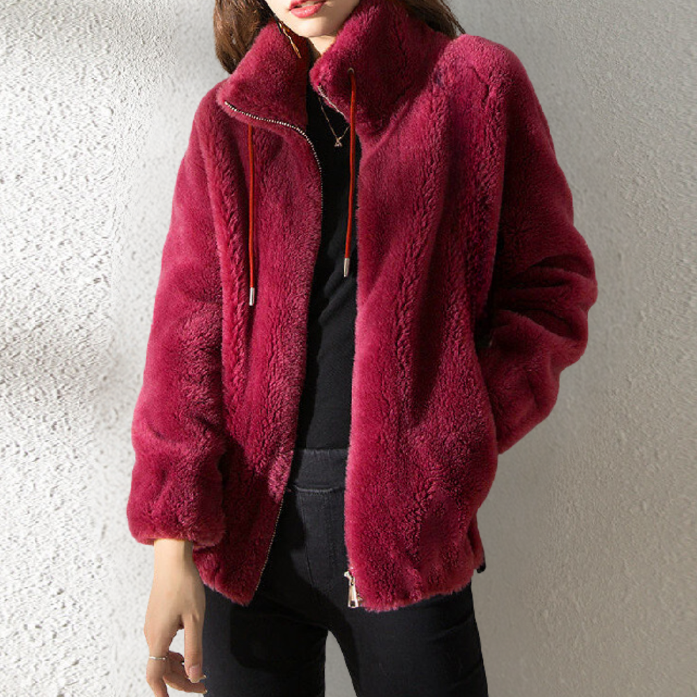 "Stylish women's warm jacket, grey, zip closure, premium polyester, elegant design, versatile fit for the chilly season."