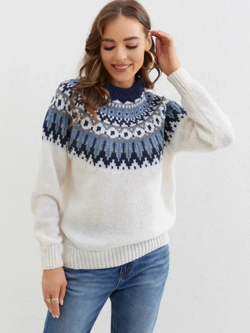 Women's all-season knit sweater with ribbed cuffs in a neutral color, featuring a classic silhouette for versatile style.