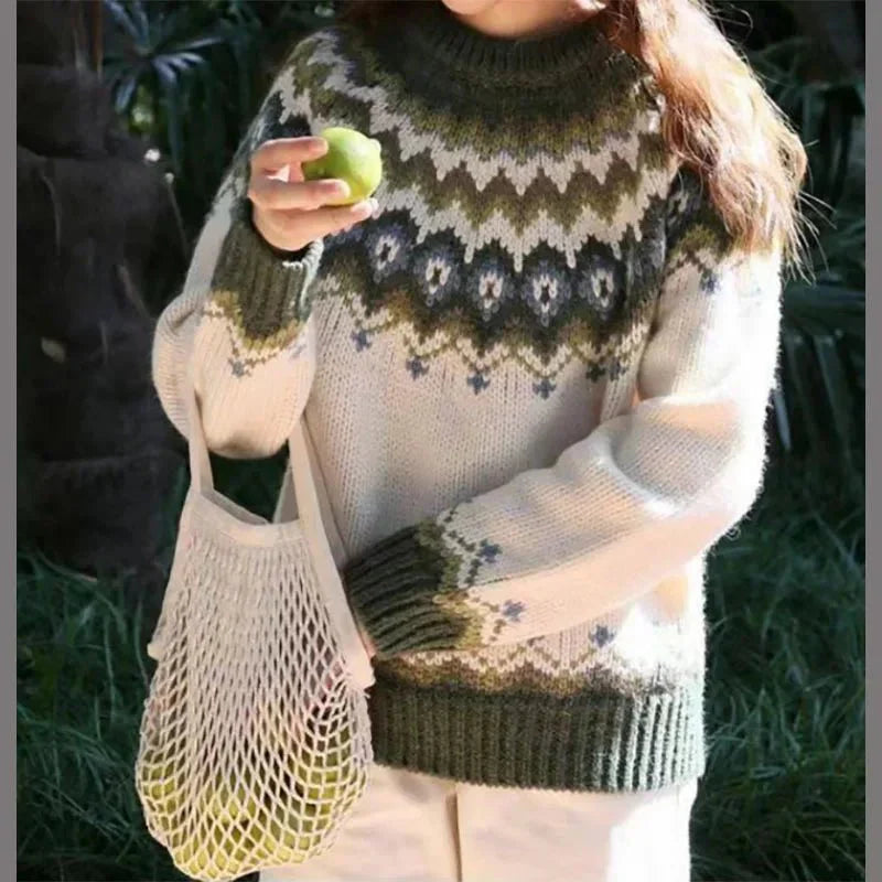 Women's all-season knit sweater with ribbed cuffs in a neutral color, featuring a classic silhouette for versatile style.