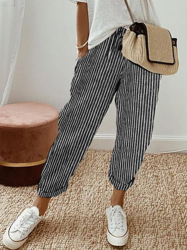 Women's breathable high-waist pants featuring a sleek silhouette, anti-sweat fabric, perfect for work and casual wear.