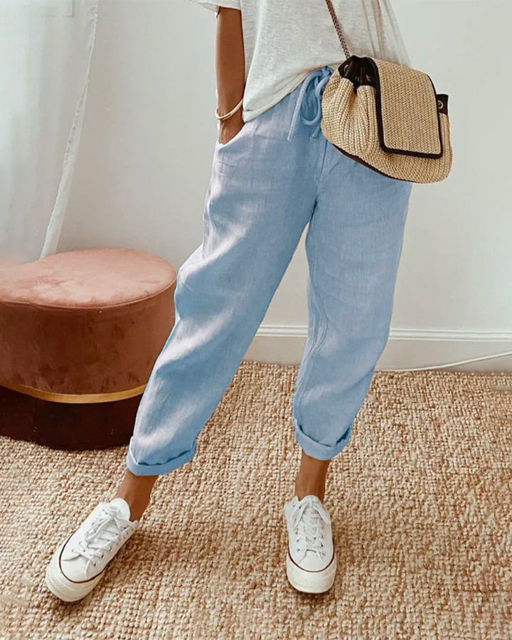 Women's breathable high-waist pants featuring a sleek silhouette, anti-sweat fabric, perfect for work and casual wear.