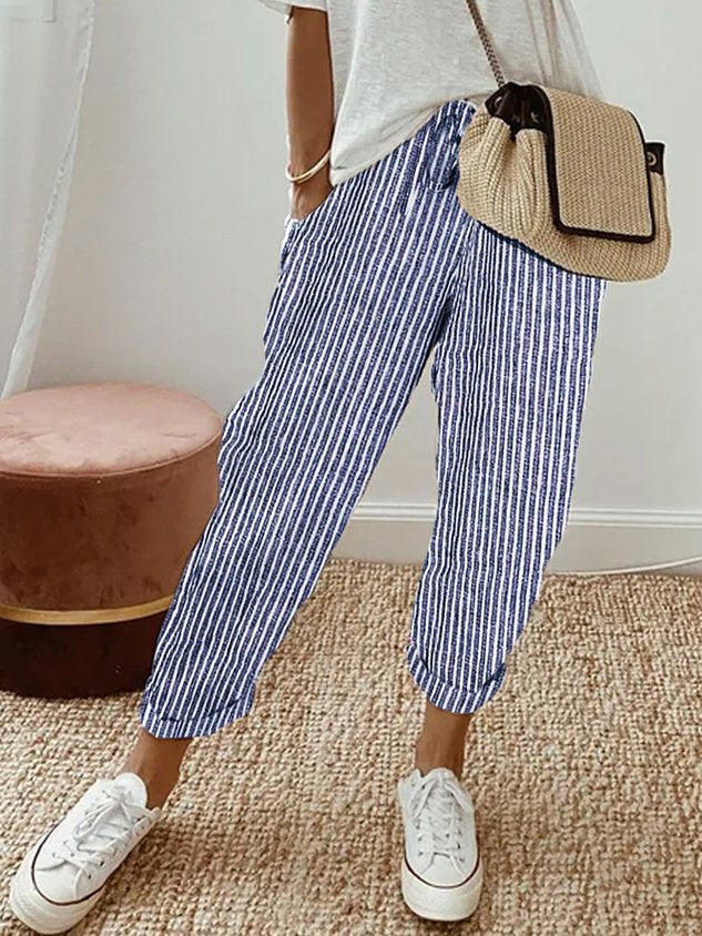Women's breathable high-waist pants featuring a sleek silhouette, anti-sweat fabric, perfect for work and casual wear.