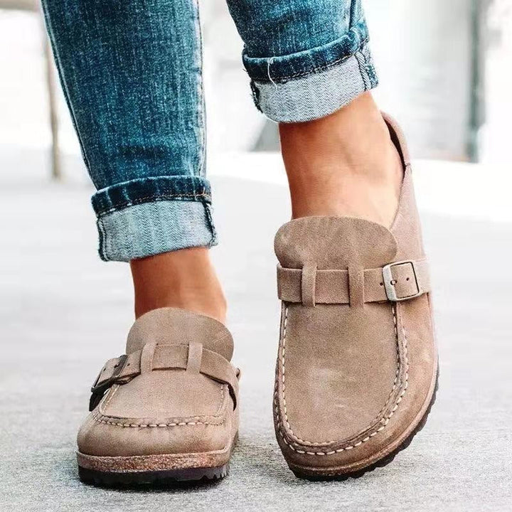 Women's casual comfort clogs in vibrant colors, slip-on design with cushioned footbed and durable soles for all-day wear.