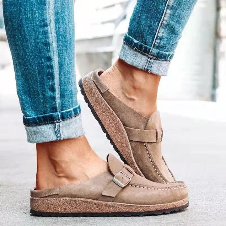 Women's casual comfort clogs in vibrant colors, slip-on design with cushioned footbed and durable soles for all-day wear.