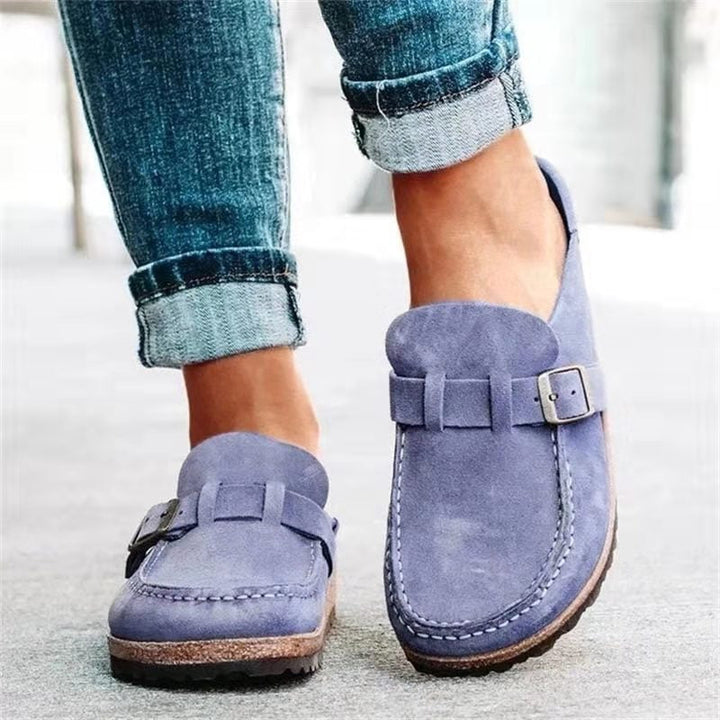Women's casual comfort clogs in vibrant colors, slip-on design with cushioned footbed and durable soles for all-day wear.