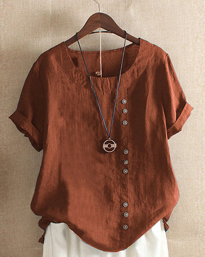 Women's cotton-linen crew neck T-shirt, front view, lightweight, breathable fabric, classic design, subtle button detailing.