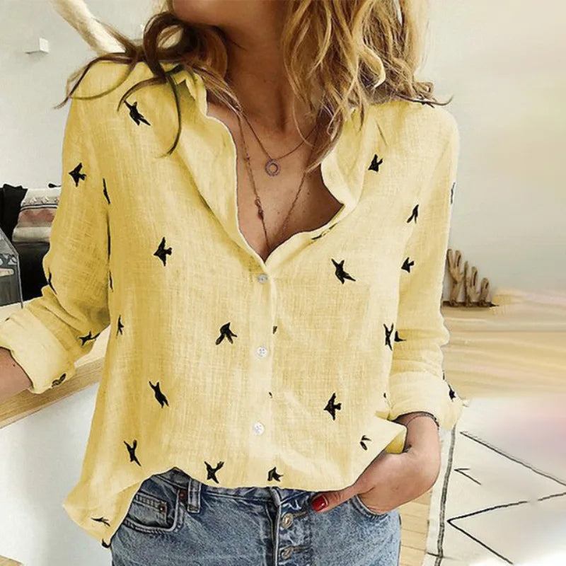 "Women's relaxed bird-print button-up blouse with colorful bird patterns, flowy silhouette, perfect for casual or office wear