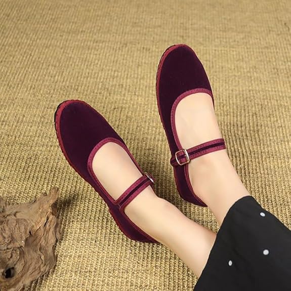 Women's velvet Mary Jane shoes with eco-friendly design, organic cotton exterior, adjustable buckle, and elegant style.