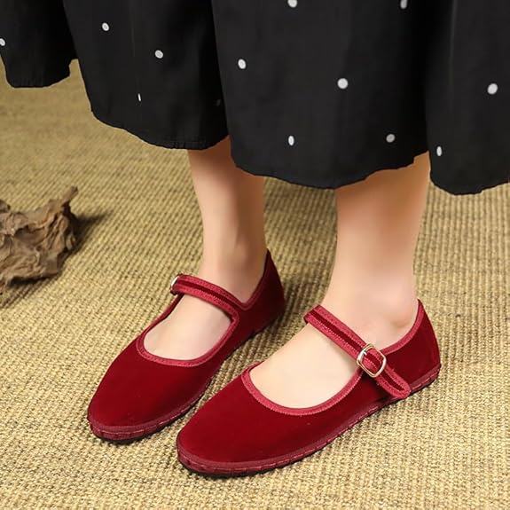 Women's velvet Mary Jane shoes with eco-friendly design, organic cotton exterior, adjustable buckle, and elegant style.