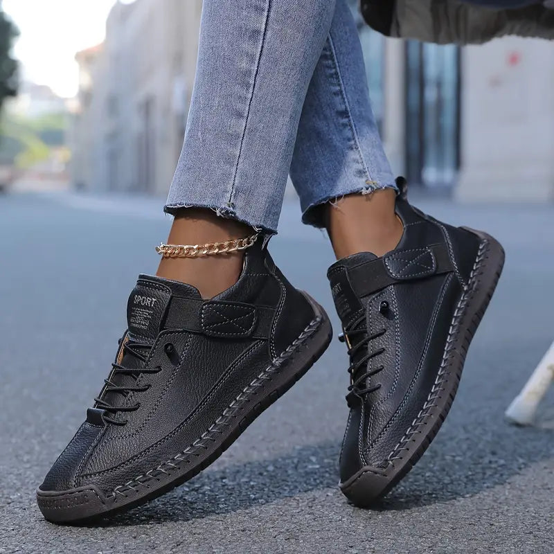 Side view of stylish women's lightweight trainers, designed for easy on-off and daily comfort.