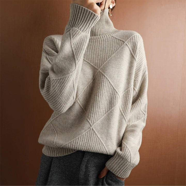 Studio shot of a women's cozy oversized ribbed knit sweater, front view