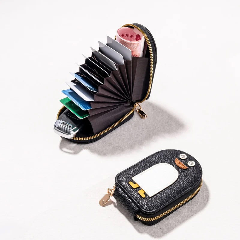 Women's PU leather cardholder with adorable penguin design and coin purse.
