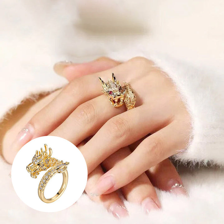 Close-up of a women's delicate dragon ring, set with brilliant zirconia stones, adjustable band