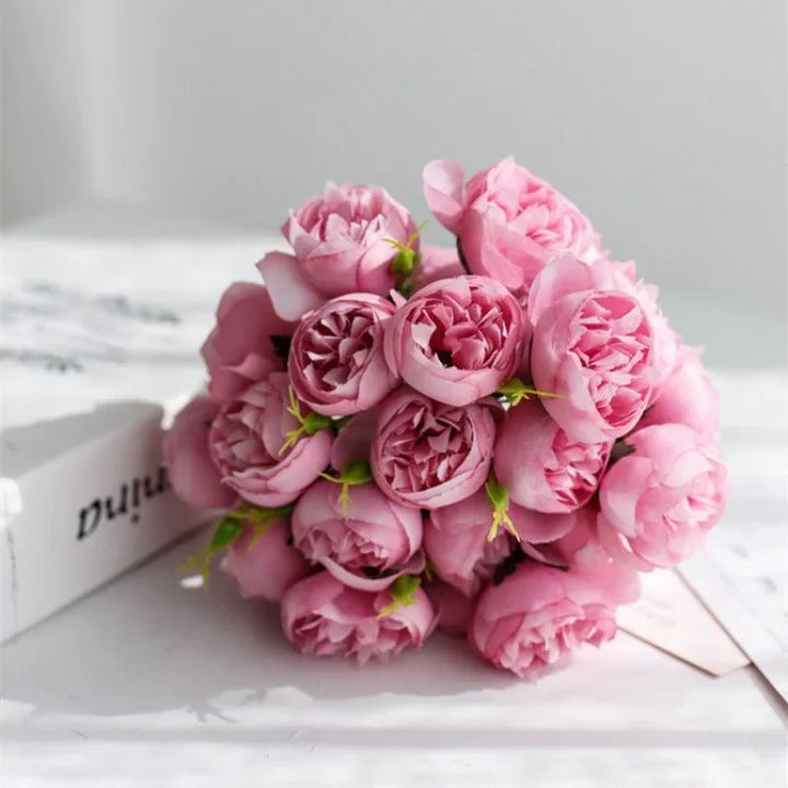 Charming faux peony bouquet, silk flowers in purple & white, enhancing any wedding or home setting.