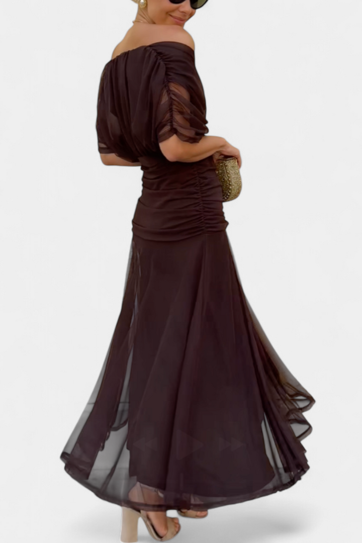 Chic women's occasion dress: a beautiful floral maxi with a stylish pleated waist and V-neck.