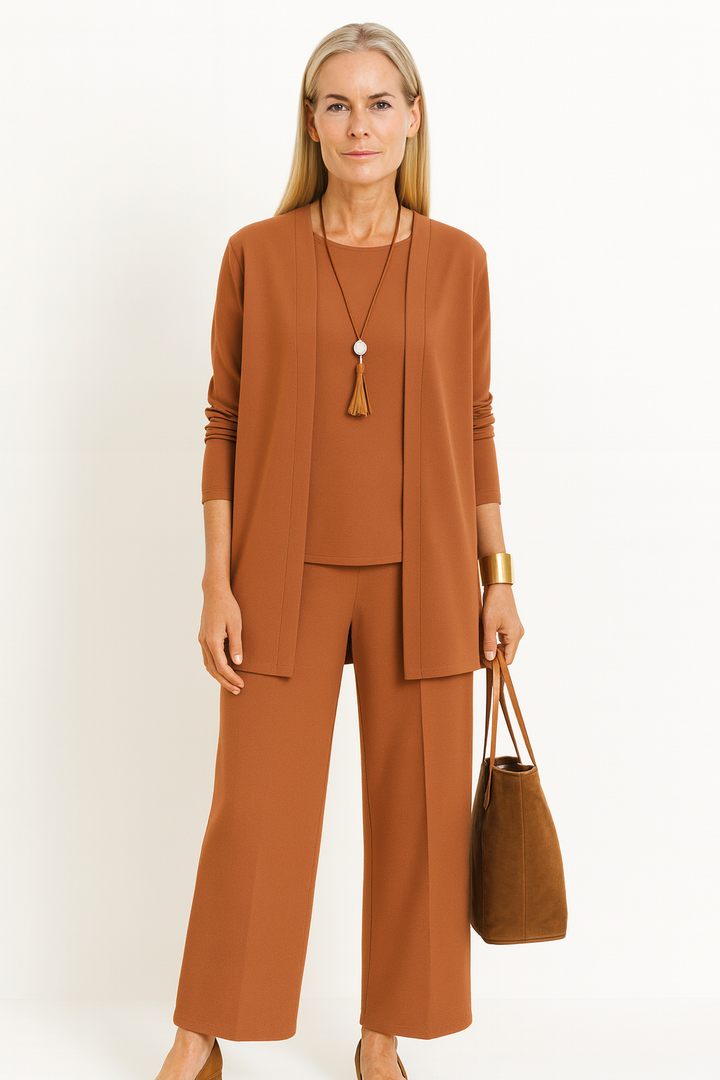 Close-up: Detail of elegant fabric on women's 3-piece versatile outfit set. High-quality fashion comfort.
