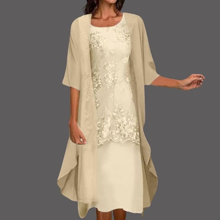 Elegant women's floral lace midi dress with sheer cardigan, perfect for formal events or cocktail parties.