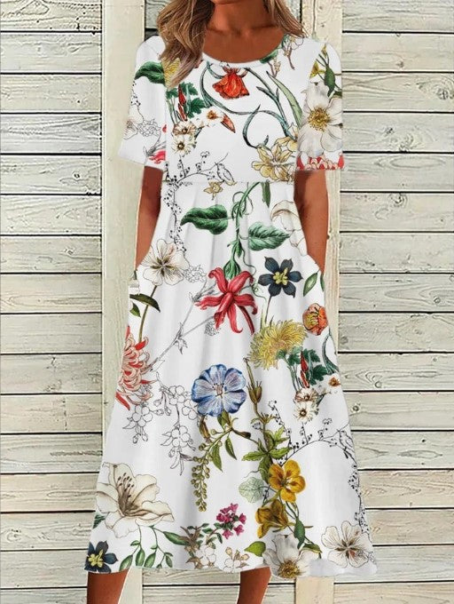 Women's casual floral print midi dress featuring short sleeves, a round neck, and practical pockets for summer.