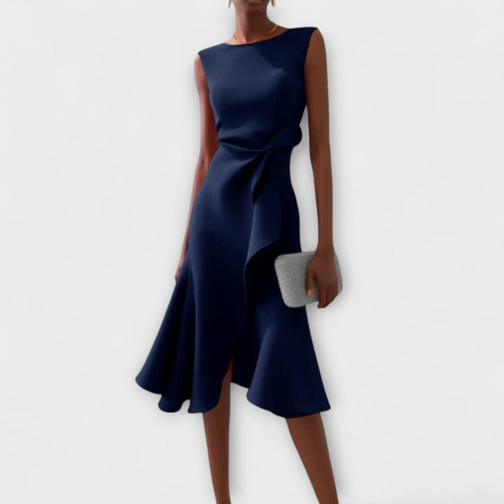 Sleeveless women's midi dress featuring a chic ruffle hem and flattering wrap design.