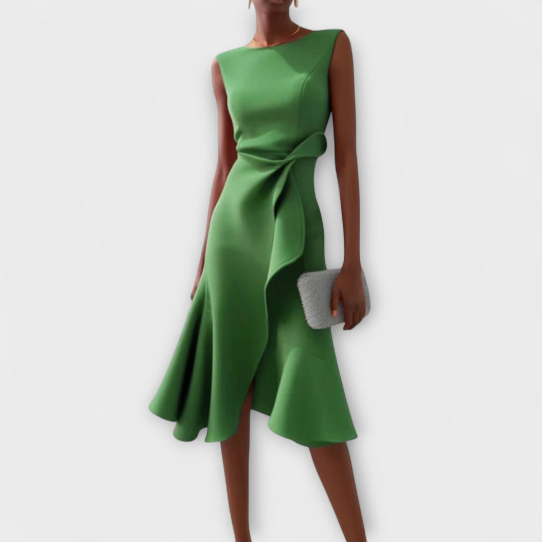 Casual yet elegant women's flared midi dress, featuring a ruffle hem, wrap detail, and round neck.