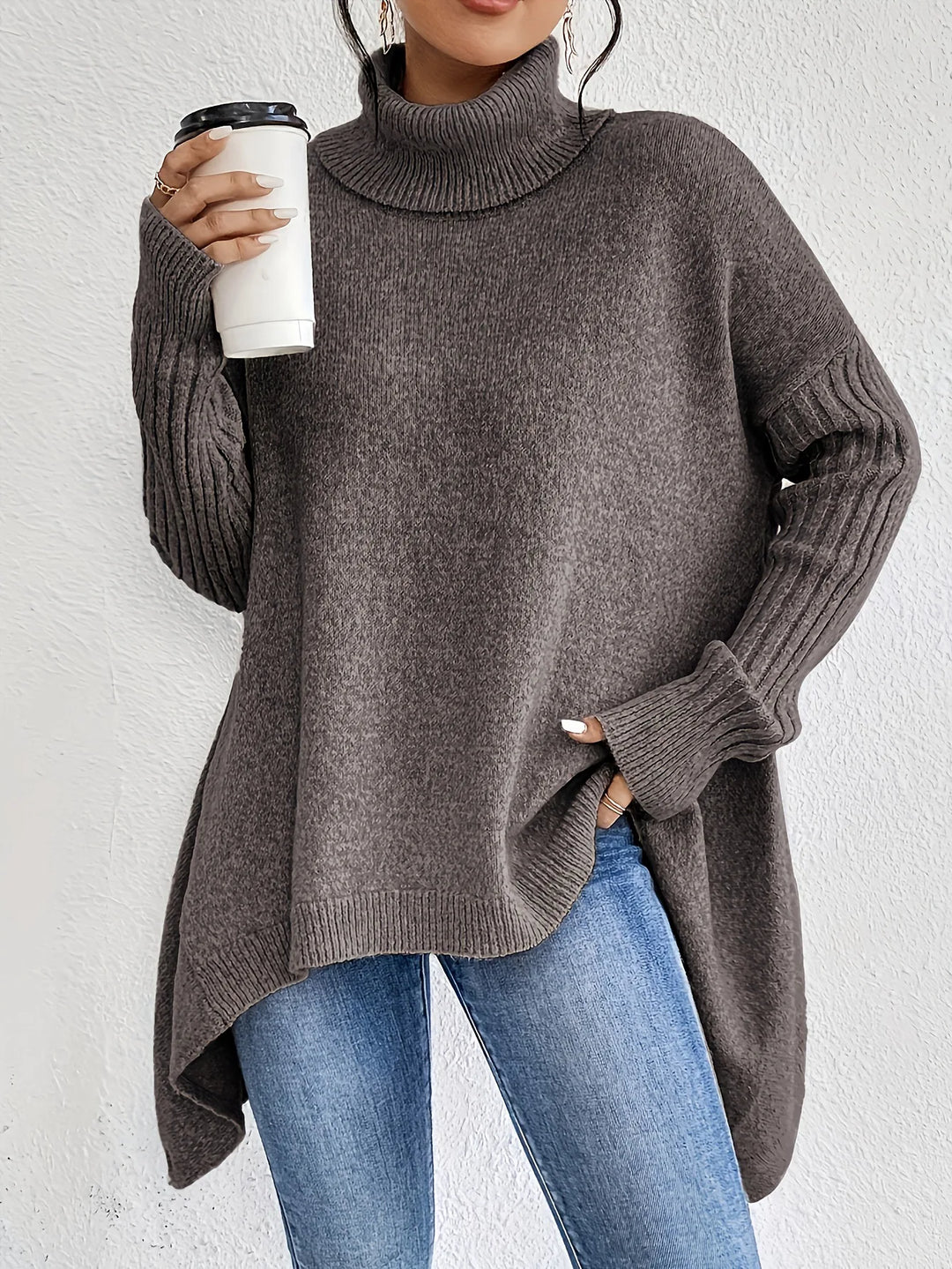 Stylish women's oversized cashmere turtleneck sweater in a beautiful knit, perfect for winter and loungewear.