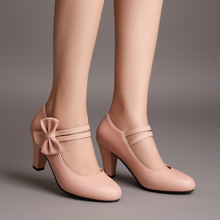 Elegant women's pink block heel pumps with a chic bow accent, perfect for parties.