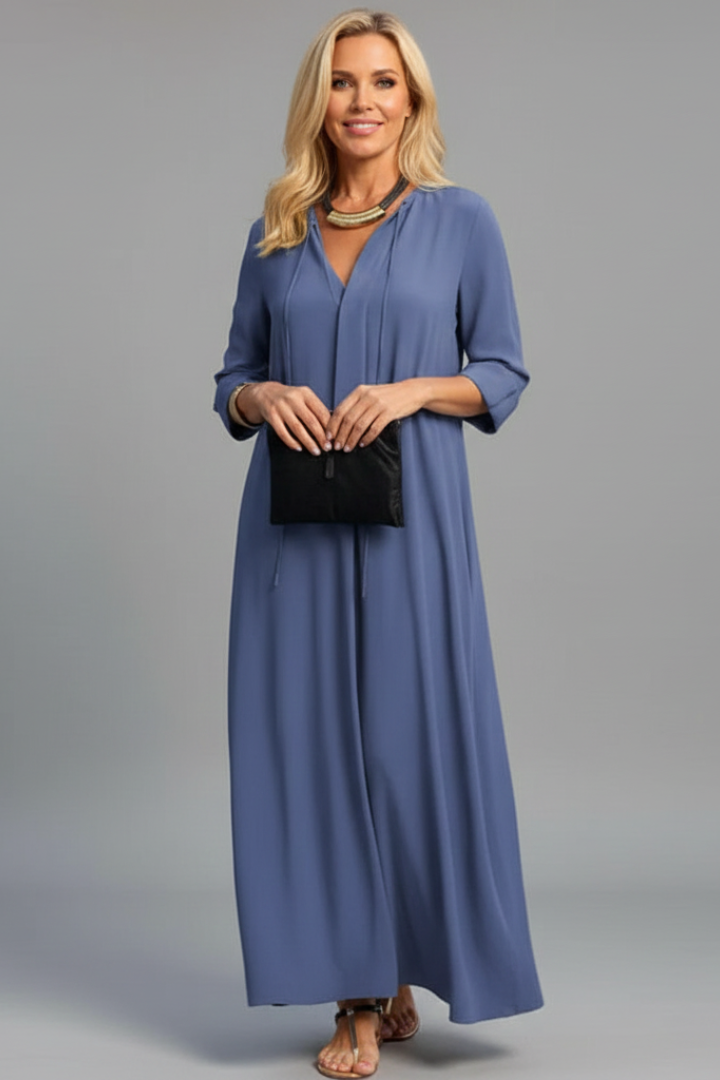 Casual elegant women's V-neck long sleeve ankle-length dress. Comfortable everyday maxi design.