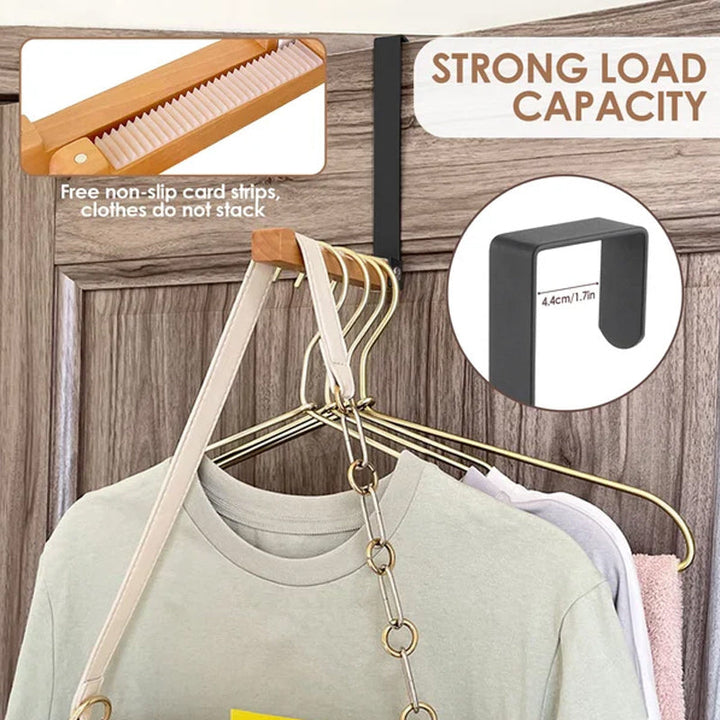 Close-up of the foldable mechanism on a wood and metal over-the-door hook, space-saving design.
