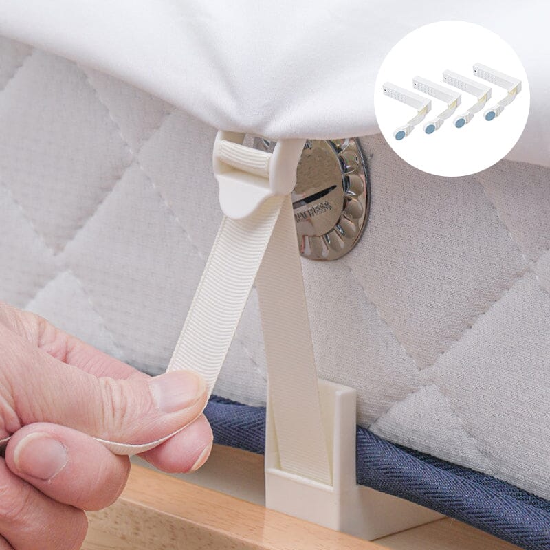 Four white universal bed sheet gripper clips, securing a fitted sheet on a mattress