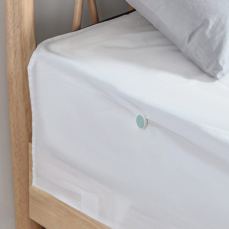 Four sheet clips neatly arranged, highlighting their compact and practical design