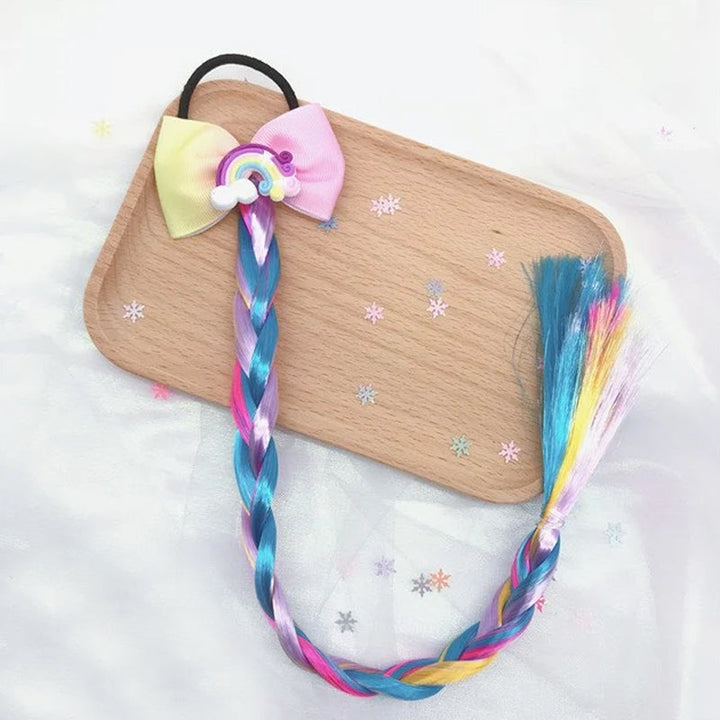 Detailed image of unicorn-themed braided hair extensions for kids, a cute costume accessory