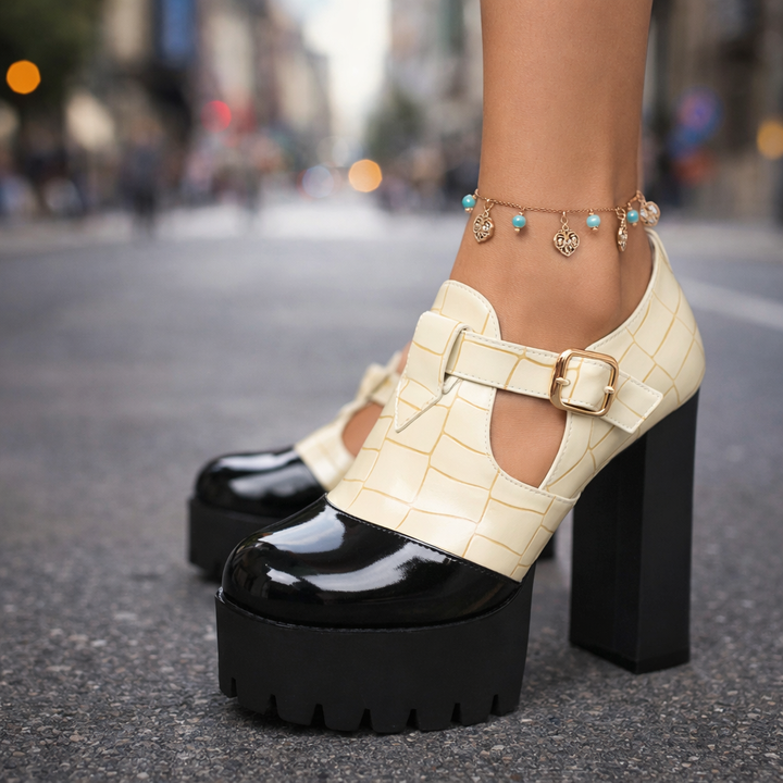 Fashionable women's glossy platform heels with an eye-catching cutout design and a reliable block heel for stability.
