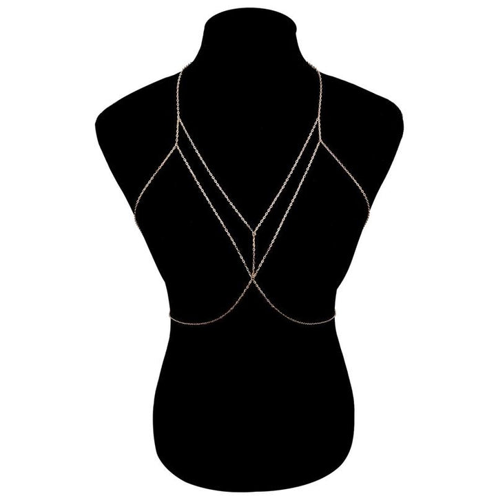 Close-up of a shimmering silver layered body chain, elegant & stylish