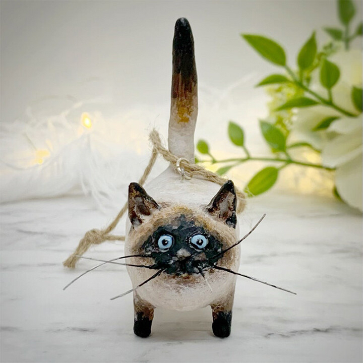 Unique miniature cat collectible, a handcrafted sculpture perfect as a thoughtful gift.