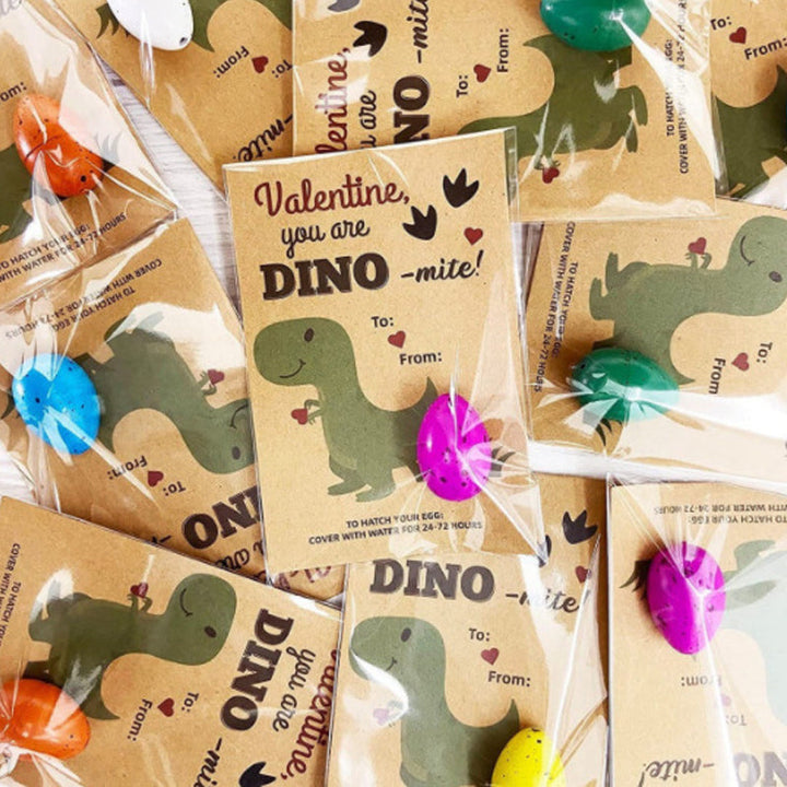 Various stages of dinosaur egg hatching shown, from whole egg to excavated dino toy