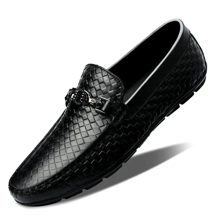 Angled shot of black men's grip loafers, highlighting the comfort and men's fashion trend