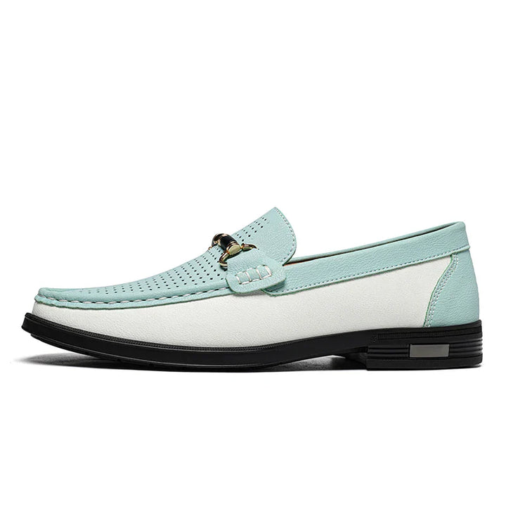 Close-up of the textured perforated leather on men's dress loafers