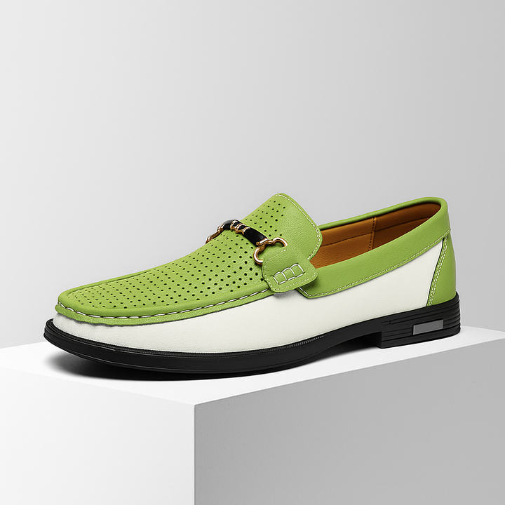 Pair of men's perforated leather bit loafers on a clean white background
