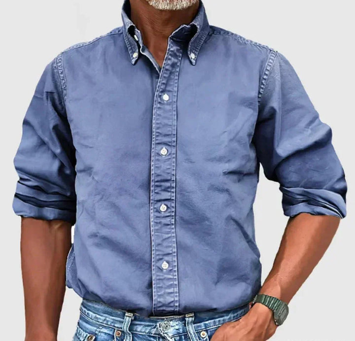 Navy blue casual button-up shirt for men, featuring long sleeves and a relaxed fit